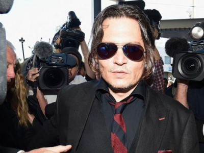 Жонни Деппыг шүүх хурал хойшилно